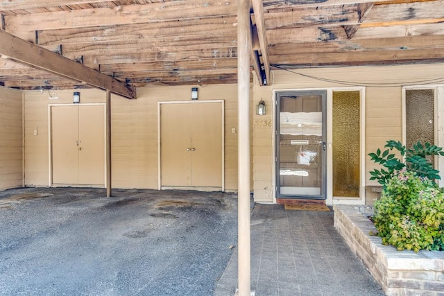 interior space featuring wooden walls