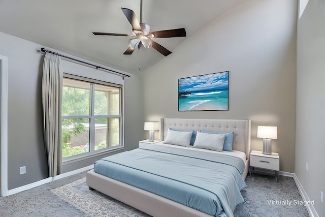 carpeted bedroom featuring lofted ceiling, ceiling fan, and baseboards