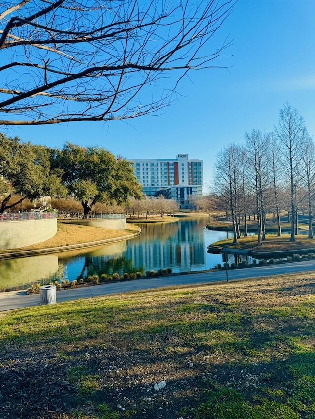 surrounding community with a water view