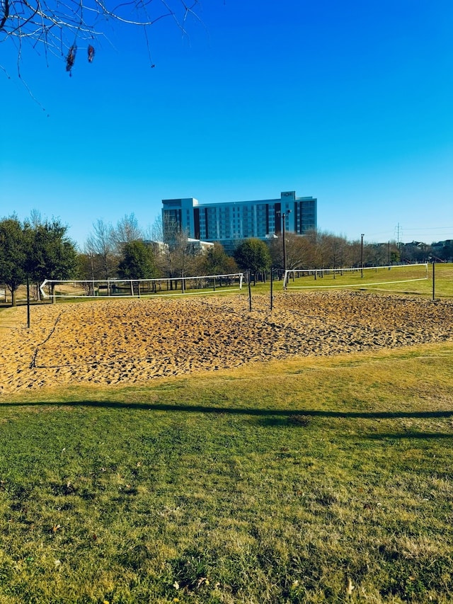 view of home's community featuring a lawn