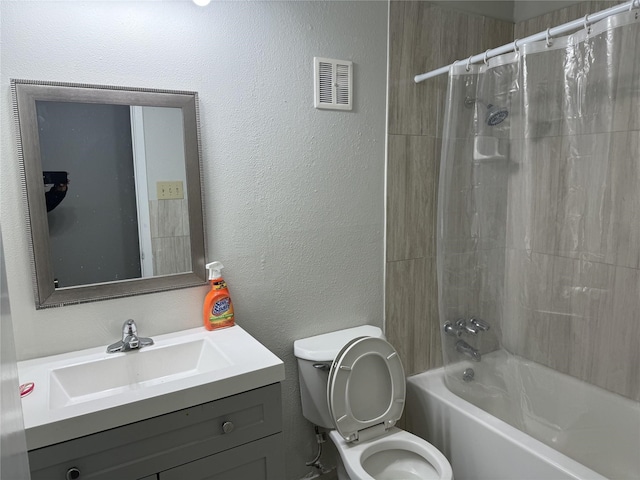 full bathroom with shower / bath combo, vanity, and toilet