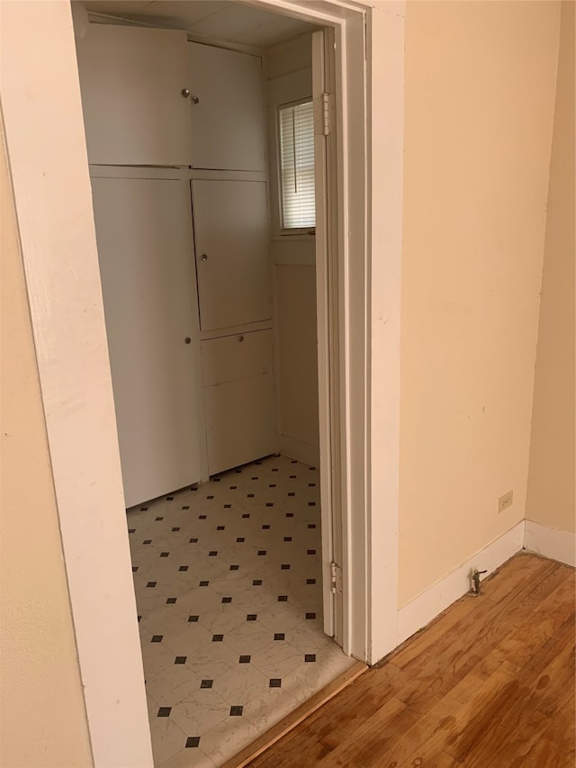 hallway featuring light wood-type flooring