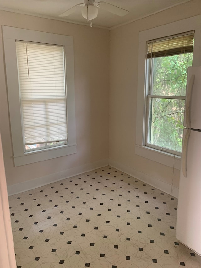 spare room with ceiling fan