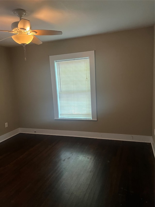 empty room with wood-type flooring and ceiling fan