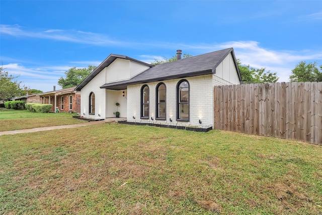 view of front of house with a front lawn