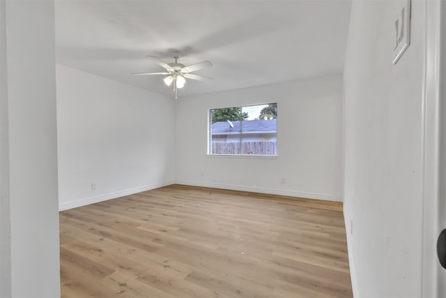 unfurnished room with light hardwood / wood-style floors and ceiling fan