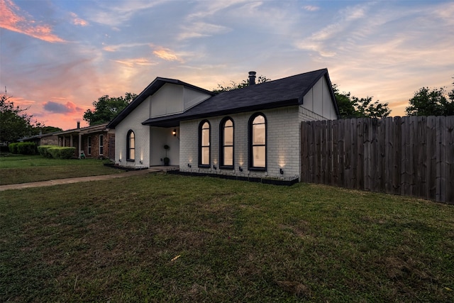 view of front of house with a lawn