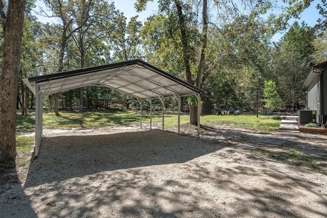 exterior space featuring central AC unit and a carport