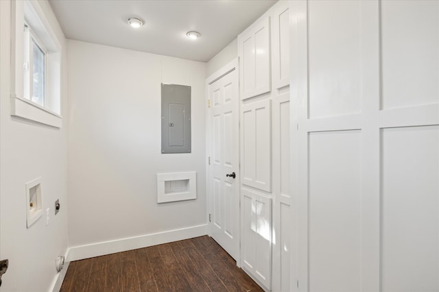 laundry area with hookup for a washing machine, electric dryer hookup, dark hardwood / wood-style flooring, electric panel, and cabinets