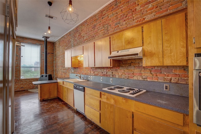 kitchen with white electric cooktop, brick wall, decorative light fixtures, dishwasher, and dark hardwood / wood-style flooring