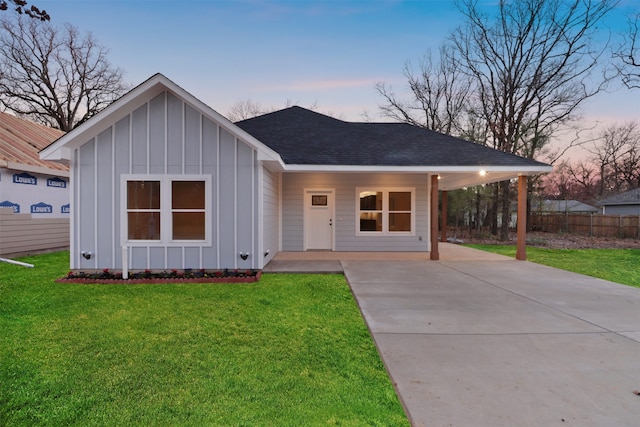 ranch-style house with a yard