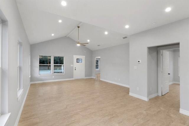 unfurnished living room with light wood-type flooring, lofted ceiling, and ceiling fan