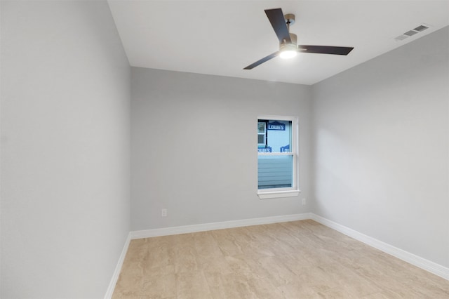 empty room with light hardwood / wood-style floors and ceiling fan