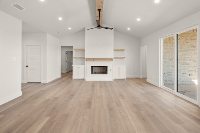 unfurnished living room featuring ceiling fan, light hardwood / wood-style floors, and vaulted ceiling with beams