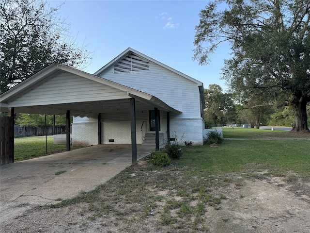 view of property exterior featuring a yard and a carport