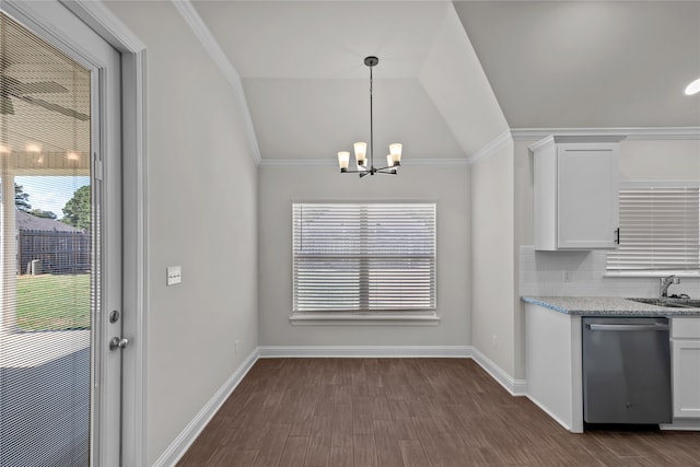 kitchen featuring dishwasher, lofted ceiling, dark hardwood / wood-style flooring, and white cabinetry