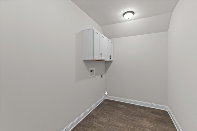 laundry area featuring hookup for a washing machine, dark hardwood / wood-style flooring, electric dryer hookup, and cabinets