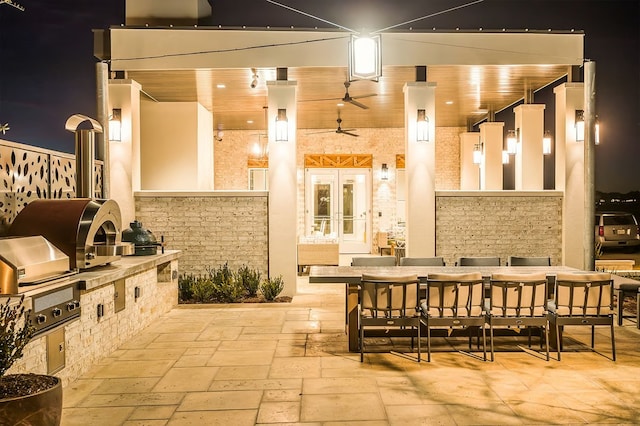 exterior space featuring exterior kitchen and french doors