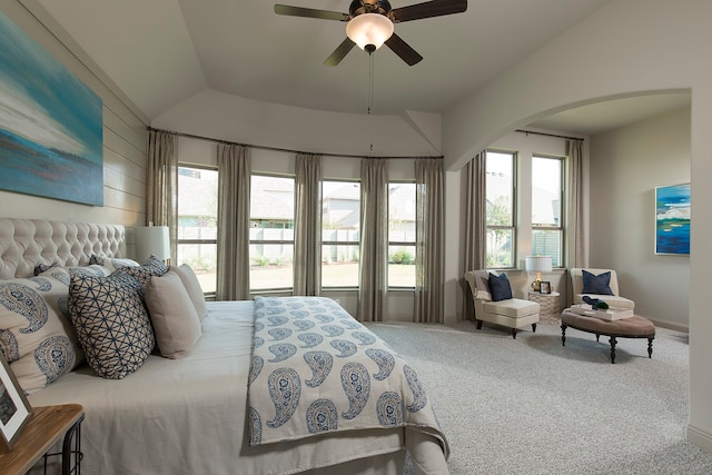 carpeted bedroom with lofted ceiling and ceiling fan