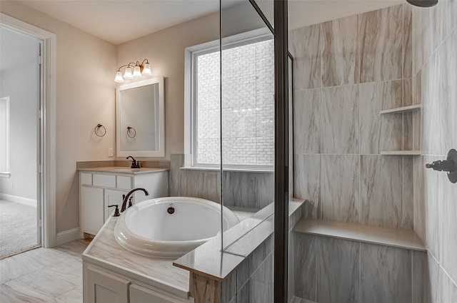 bathroom with shower with separate bathtub, tile patterned floors, and vanity