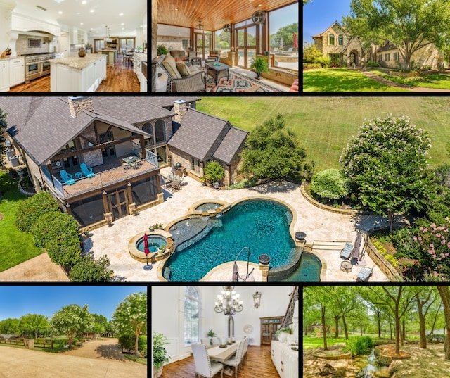 view of swimming pool with a patio, a lawn, and an outdoor kitchen