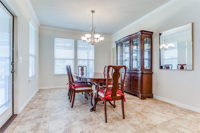 dining space featuring a chandelier, a healthy amount of sunlight, and ornamental molding