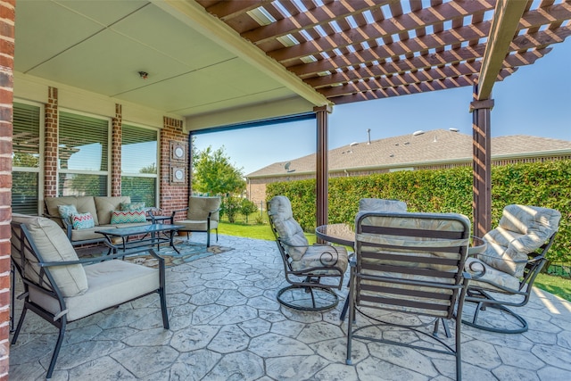 view of patio featuring an outdoor living space and a pergola