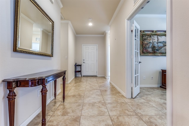 hallway featuring light tile patterned floors and ornamental molding