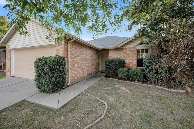 single story home with a garage