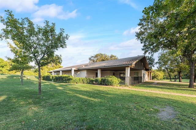 exterior space with a lawn