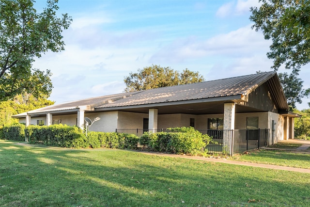 exterior space with a yard