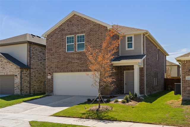 front of property featuring a garage, central air condition unit, and a front yard