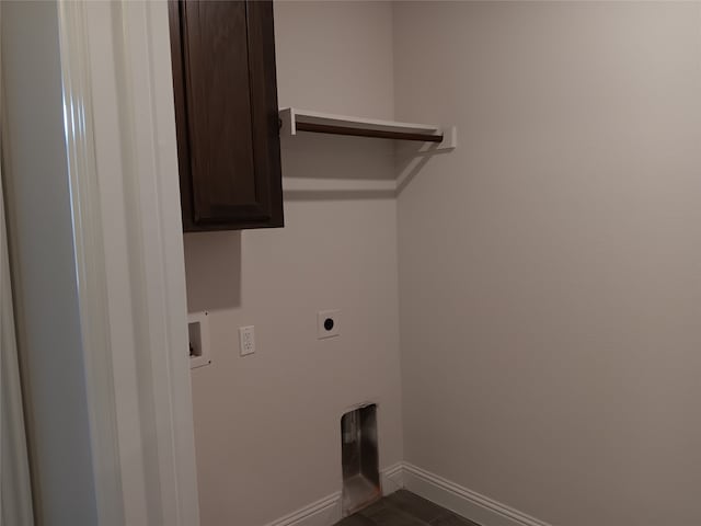 laundry room with washer hookup, hookup for an electric dryer, and cabinets