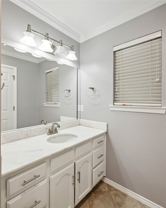 bathroom featuring vanity, tile patterned floors, and crown molding