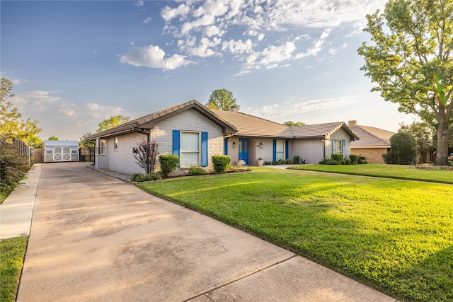 ranch-style house with a front yard