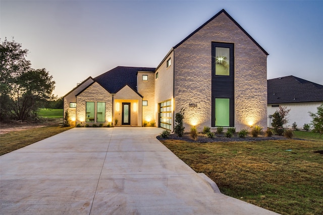 view of front of house with a lawn