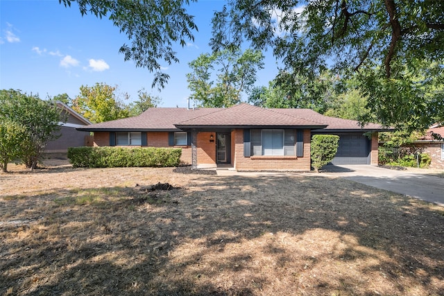 ranch-style home with a garage