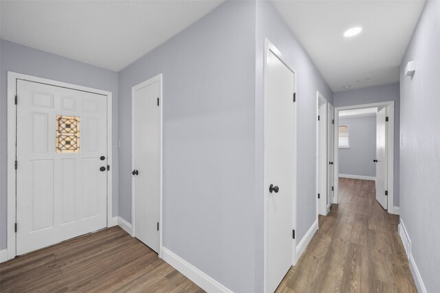 foyer entrance featuring hardwood / wood-style floors