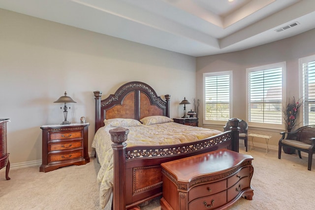 bedroom featuring light carpet