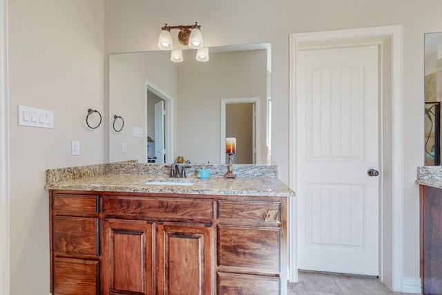 bathroom featuring vanity and tile patterned flooring