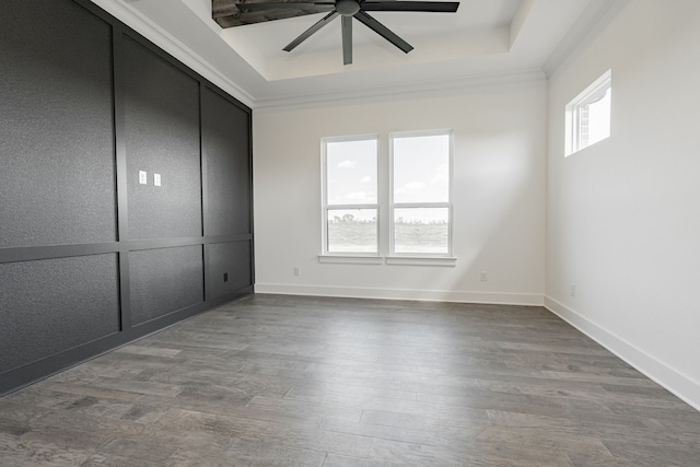 unfurnished bedroom featuring ceiling fan, hardwood / wood-style flooring, and crown molding