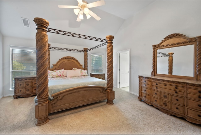 bedroom with carpet floors, lofted ceiling, and ceiling fan