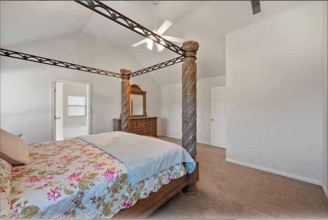 bedroom featuring carpet floors, vaulted ceiling, ceiling fan, and ensuite bathroom