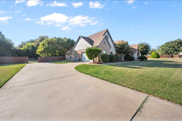 view of property exterior featuring a garage and a lawn