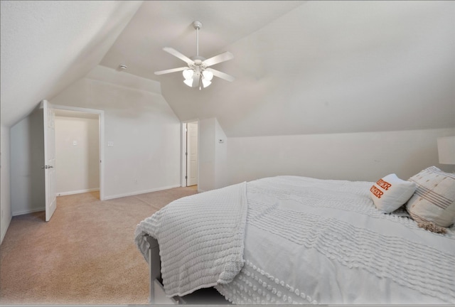 bedroom with light carpet, lofted ceiling, and ceiling fan