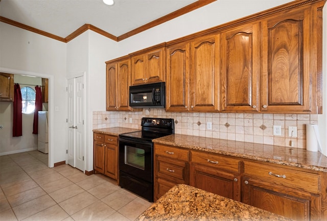 kitchen with ornamental molding, light tile patterned floors, backsplash, black appliances, and light stone countertops