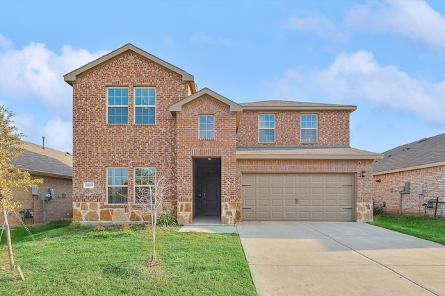 front of property with a garage and a front yard