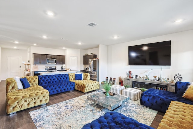 living room featuring dark hardwood / wood-style floors