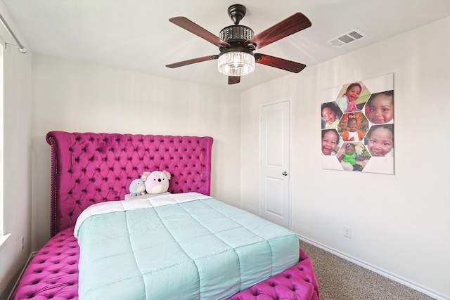 bedroom with ceiling fan and carpet floors