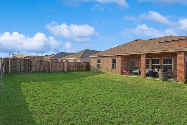 view of yard with a patio area